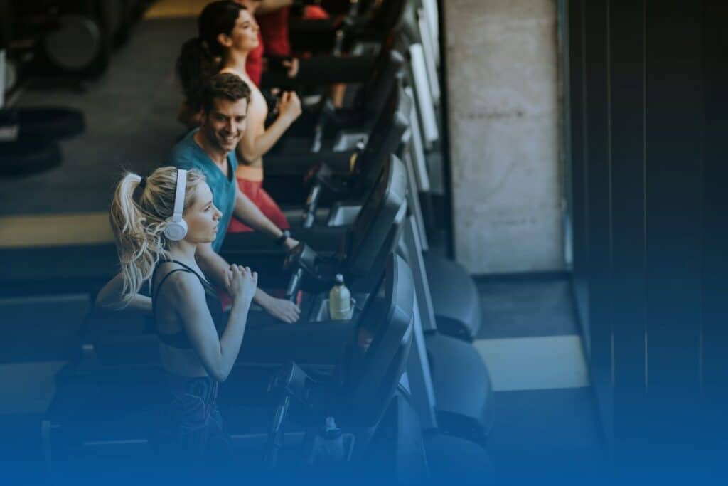 young runners on the treadmill at the gym