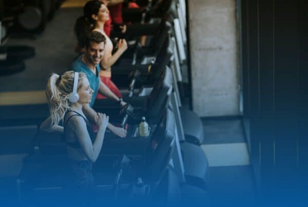 young runners on the treadmill at the gym