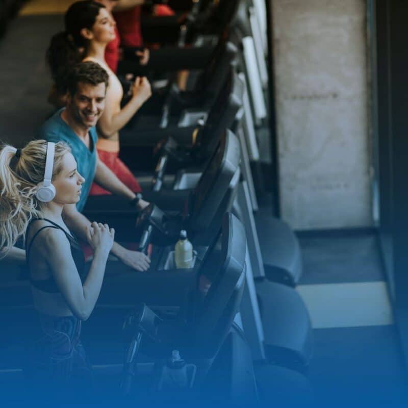 young runners on the treadmill at the gym