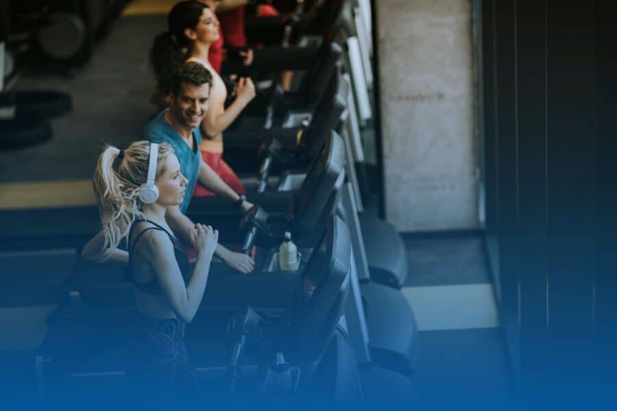 young runners on the treadmill at the gym